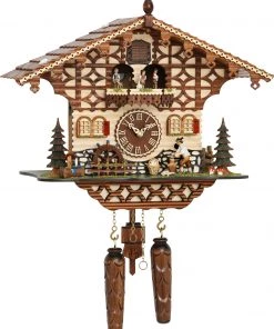 Frankenmuth Clock Company KU4212QMT - Quartz Musical Chalet With Wood Chopper